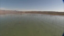Water floods a broad plain near Hoover Dam. Stock Footage