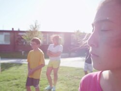 MS SLO MO Group of kids listening to coach give instructions during athletics class Stock Footage