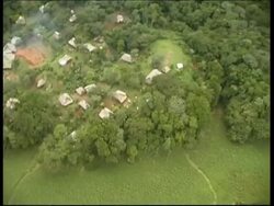 Native american village in rainforest, aerial view, POV helicopter, Panama, Central America Stock Footage
