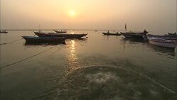 A young man dives into the Ganges River. Stock Footage