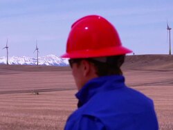 Field Technician Inspecting Wind Generators Stock Footage