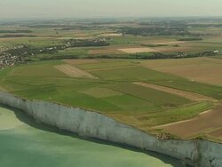 AERIAL, White cliffs and fields of Ault, Picardie, France Stock Footage