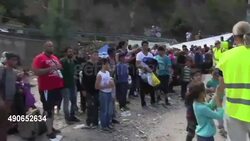 CLEAN : Greece puts on transport for arriving migrants News Clip