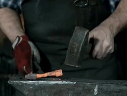 HD DOLLY: Blacksmith Forging A Horseshoe Stock Footage
