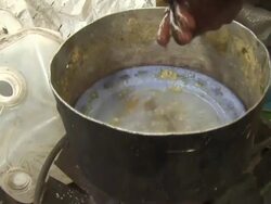 Woman washing her hands with dirty water Stock Footage