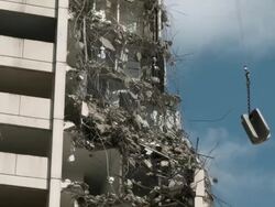 MS Wrecking ball demolishing building / Chicago, Illinois, USA Stock Footage