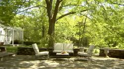 MS, USA, New York State, Bedford Hills, outdoor seating area in back garden Stock Footage
