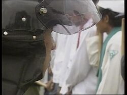 Police in violent clashes with anti-US protestors. News Clip