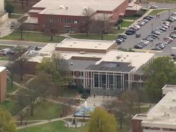 MS AERIAL Shot A&T University and car in parking lot / North Carolina, United States Stock Footage