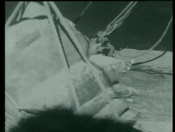 Unloading cement from the SS Ionian (a British Steam freighter) on to Nile boats for building Egypts roads, 1939 Stock Footage