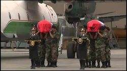 Bodies of 2 police killed by Shining Path rebels flown to capital News Clip