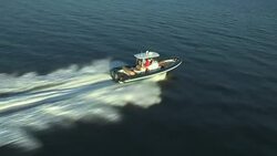 A couple speeds across Narragansett Bay in their yacht. Stock Footage