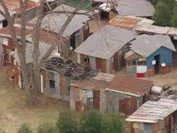 MS AERIAL View of Habitat for Humanity Int Global Village / Georgia, United States Stock Footage