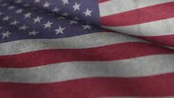 Close-up of dirty USA flag waving in the wind Stock Footage