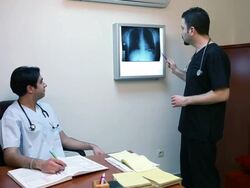 Doctors Discuss X-Ray Stock Footage