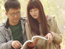 Couple reading Stock Footage