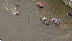 Aerials of Fishing for Leave and Vote Remain EU Referendum Campaign Boats on the River Thames News Clip