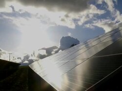 HD Solar Park Against Dramatic Sky Dolly Shot TL Stock Footage