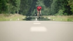 Man riding racing bike Stock Footage