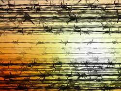 BARBED WIRE - clouds against sun. slow expanding flow (loop) Stock Footage