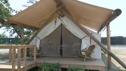 Luxury tents, gourmet meals redefine camping on NYC island News Clip