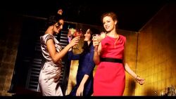 Three women dacing with cocktail drinks Stock Footage