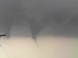 Tornado forms close by Harper, Kansas, close up of forming funnel, funnel hangs from clouds above, WA, USA Stock Footage