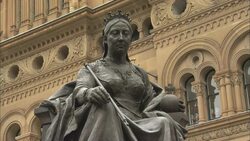 A statue of Queen Victoria stands in front of the Queen Victoria Building, Sydney, Australia. Stock Footage