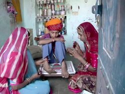 MS Young Indian groom getting henna tattoo for his wedding / Rajasthan, India Stock Footage
