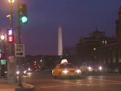 Washington Monument and street, evening, USA Stock Footage