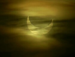 partial solar eclipse with airplane Stock Footage