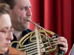 horn player in orchestra Stock Footage