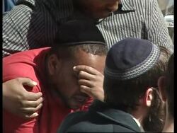 Bodies arriving for funeral service News Clip