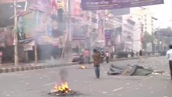 Security forces clash with opposition activists denouncing war crimes trials News Clip