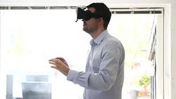 Virtual reality headet worn by man Stock Footage