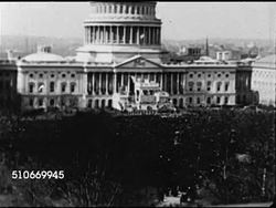 1921: HARDING INAUGURATION: HA XWS Capitol building w/ crowd below. HA MS Convertible w/ outgoing President Woodrow Wilson in back seat sitting next to President-elect Warren G. Harding. MS President Woodrow Wilson & Harding, car driving out of frame. Instructional Video
