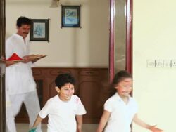 Family playing holi festival  Stock Footage