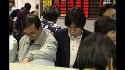 Stocks & Shares Traded at a Centre in Shanghai News Clip