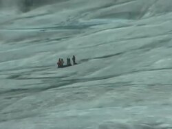 Rescue Stranded People on Glacier, from Emergency Services Helicopter Stock Footage
