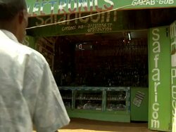 Man walking into electronic store Stock Footage