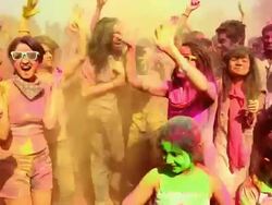 Group of people playing holi and dancing, Delhi, India Stock Footage