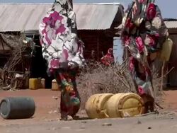 Women rolls water canister Stock Footage