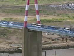 MS AERIAL ZO Shot of traffic at Saint Nazaire Bridge / Pais de la Loire, France Stock Footage