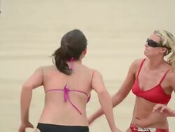 MS PAN Women playing beach volleyball and celebrating point / Redondo Beach, California, United States Stock Footage