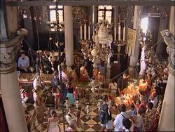 NEWS FEATURE Faithful walk on hands and knees up hill to revered icon News Clip