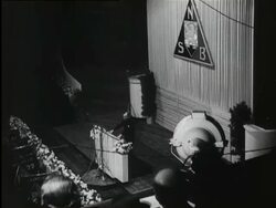 Mussert gives a speech. After the speech the audience sings the Dutch national anthem Stock Footage