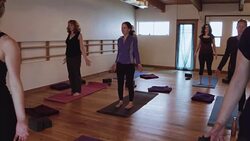 Walking through a yoga session Stock Footage