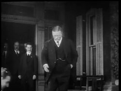 B/W 1910s Theodore Roosevelt saluting young Boy Scout on steps of  Sagamore Hill, NY / newsreel Stock Footage
