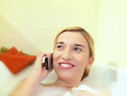 HD: On The Phone In Bath Tub Stock Footage