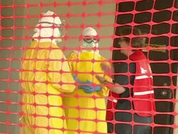 Trainees with PPEs listening to trainers at Center for Domestic Preparedness Stock Footage
